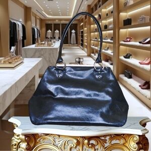 Large kiss-lock patent faux leather shoulder frame bag with silver hardware